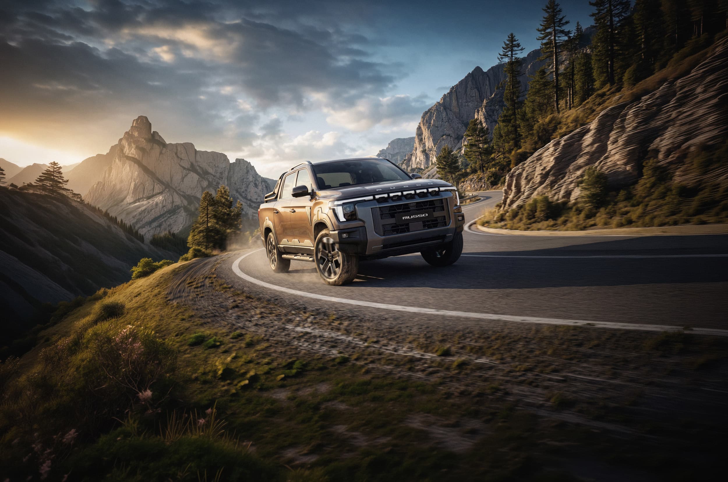 A rugged KGM Musso navigates a winding mountain road at sunset, surrounded by rocky cliffs and pine trees under a dramatic sky.