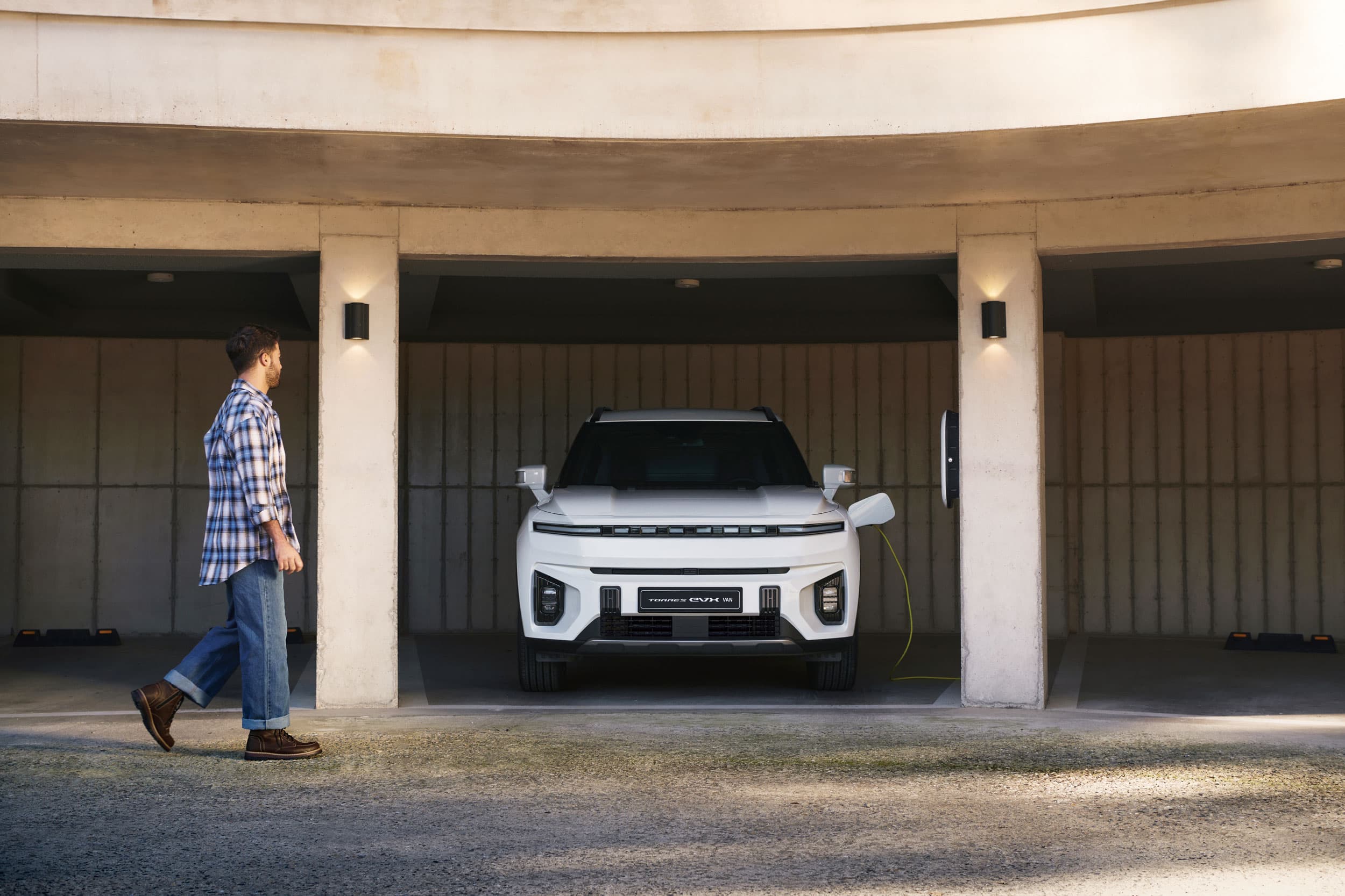 KGM Torres EVX VAN charging in garage